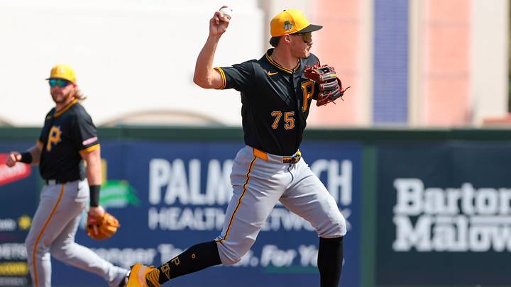 Mar 1, 2026; Jupiter, Florida, USA; Pittsburgh Pirates shortstop Konnor Griffin (75) turns a double play against the St. Louis Cardinals during the second inning at Roger Dean Chevrolet Stadium. Mandatory Credit: Sam Navarro-Imagn Images
