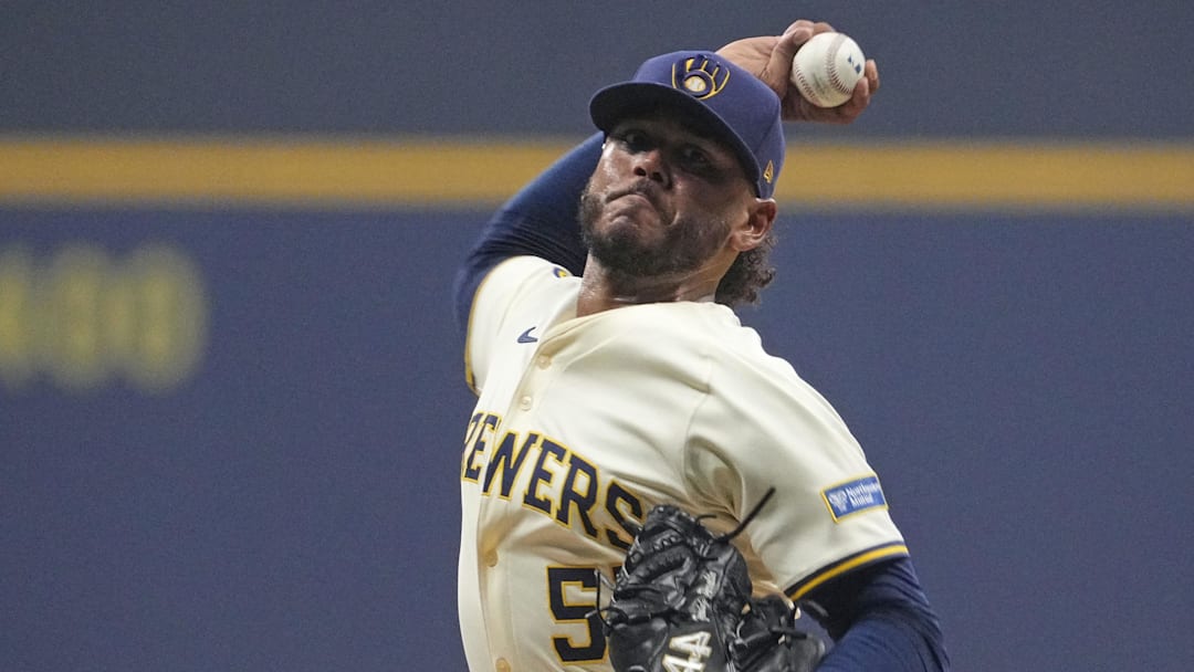 Oct 14, 2025; Milwaukee, Wisconsin, USA; Milwaukee Brewers pitcher Freddy Peralta (51) throws pitch against the Los Angeles Dodgers in the first inning during game two of the NLCS round for the 2025 MLB playoffs at American Family Field. Mandatory Credit: Michael McLoone-Imagn Images