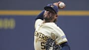 Oct 14, 2025; Milwaukee, Wisconsin, USA; Milwaukee Brewers pitcher Freddy Peralta (51) throws pitch against the Los Angeles Dodgers in the first inning during game two of the NLCS round for the 2025 MLB playoffs at American Family Field. Mandatory Credit: Michael McLoone-Imagn Images