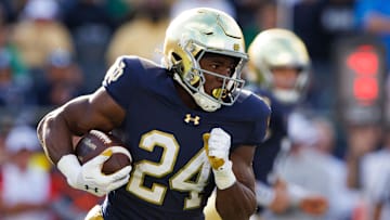 Notre Dame running back Jadarian Price runs the ball up the field during a NCAA college football game between Notre Dame and Northern Illinois at Notre Dame Stadium on Saturday, Sept. 7, 2024, in South Bend.