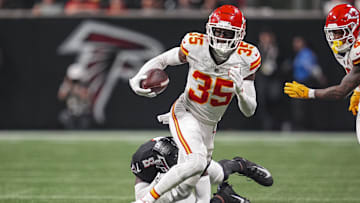 Sep 22, 2024; Atlanta, Georgia, USA; Kansas City Chiefs cornerback Jaylen Watson (35) runs after taking a lateral after an interception against the Atlanta Falcons during the second half at Mercedes-Benz Stadium. Mandatory Credit: Dale Zanine-Imagn Images