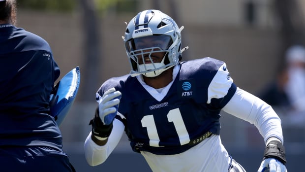 Dallas Cowboys linebacker Micah Parsons (11) runs a drill during training camp at the River Ridge Playing Fields in Oxnard, C