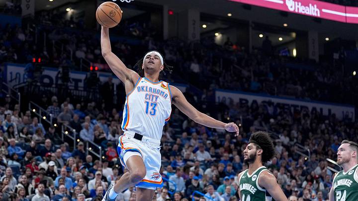 Oklahoma City forward Ousmane Dieng (13) dunks the ball in the second quarter during an NBA game between Oklahoma City and Milwaukee at the Paycom Center in Oklahoma City on Monday, Feb. 3, 2025.
