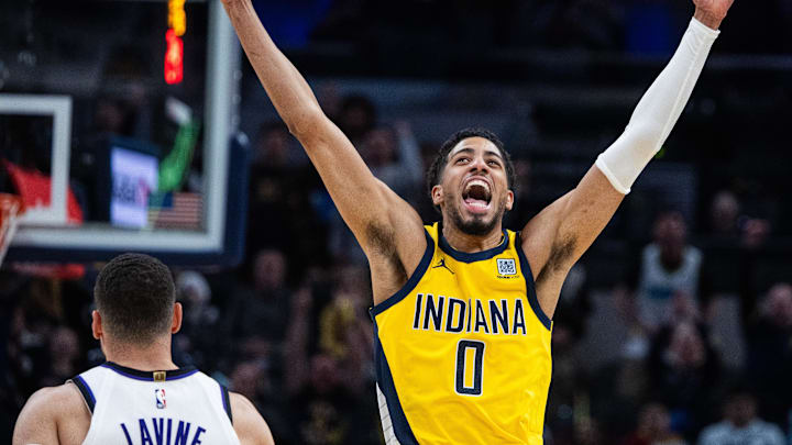 Mar 31, 2025; Indianapolis, Indiana, USA; Indiana Pacers guard Tyrese Haliburton (0) celebrates the game winning basket in the second half against the Sacramento Kings at Gainbridge Fieldhouse. Mandatory Credit: Trevor Ruszkowski-Imagn Images