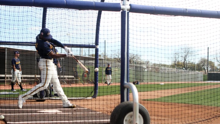 Milwaukee Brewers prospect Joe Gray Jr. takes a cut during minor league workouts at American Family