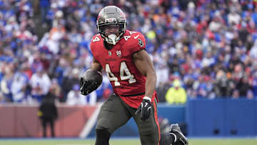 Nov 16, 2025; Orchard Park, New York, USA;  Tampa Bay Buccaneers running back Sean Tucker (44) runs the ball for a touchdown against the Buffalo Bills during the second half of the game at Highmark Stadium. Mandatory Credit: Gregory Fisher-Imagn Images