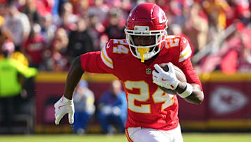 Nov 23, 2025; Kansas City, Missouri, USA;  Kansas City Chiefs running back Brashard Smith (24) runs against the Indianapolis Colts in the first half at GEHA Field at Arrowhead Stadium.