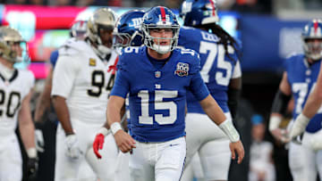 Dec 8, 2024; East Rutherford, New Jersey, USA; New York Giants quarterback Tommy DeVito (15) reacts during the fourth quarter against the New Orleans Saints at MetLife Stadium.  