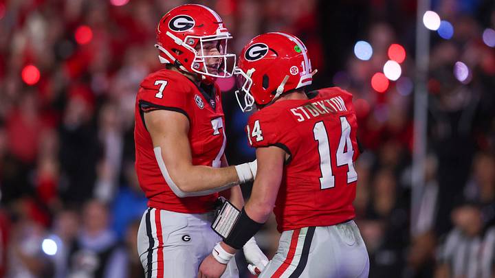 Nov 15, 2025; Athens, Georgia, USA; Georgia Bulldogs tight end Lawson Luckie (7) and quarterback Gunner Stockton (14) celebrate in the second half against the Texas Longhorns at Sanford Stadium. Mandatory Credit: Brett Davis-Imagn Images