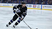 Feb 1, 2025; Tampa, Florida, USA; Tampa Bay Lightning left wing Brandon Hagel (38) controls the puck against the New York Islanders in the second period at Amalie Arena. Mandatory Credit: Nathan Ray Seebeck-Imagn Images