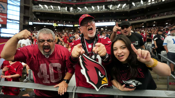 Arizona Cardinals fans cheer on their team during their 28-16 win against the Dallas Cowboys at State Farm Stadium in Glendale on Set. 24, 2023.