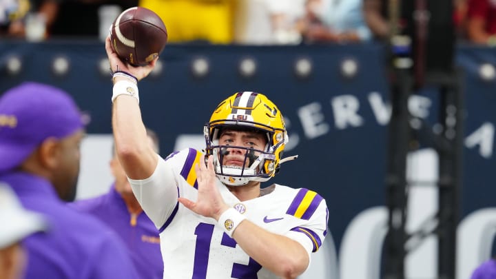 Sep 1, 2024; Paradise, Nevada, USA; LSU Tigers quarterback Garrett Nussmeier (13) warms up before a game against the Southern California Trojans at Allegiant Stadium. Mandatory Credit: Stephen R. Sylvanie-USA TODAY Sports