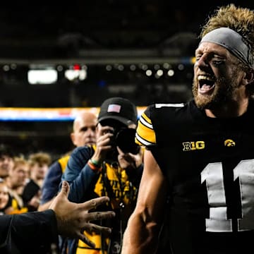 Iowa Hawkeyes quarterback Mark Gronowski (11) celebrates after defeating the Penn State Nittany Lions 25-24 Oct. 18, 2025, at Kinnick Stadium in Iowa City, Iowa.