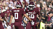 Nov 15, 2025; College Station, Texas, USA; Texas A&M Aggies quarterback Marcel Reed (10) celebrates with wide receiver Izaiah Williams (0) after an Aggies touchdown during the third quarter against the South Carolina Gamecocks at Kyle Field. Mandatory Credit: Troy Taormina-Imagn Images