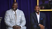 Mar 24, 2017; Los Angeles, CA, USA; Los Angeles Lakers former center Shaquille O'Neal (left) and guard Kobe Bryant react during ceremony to unveil statue of O'Neal at Staples Center. Mandatory Credit: Kirby Lee-Imagn Images