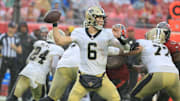 Dec 7, 2025; Tampa, Florida, USA; New Orleans Saints quarterback Tyler Shough (6) throws downfield during the third quarter against the Tampa Bay Buccaneers at Raymond James Stadium. Mandatory Credit: Kim Klement Neitzel-Imagn Images