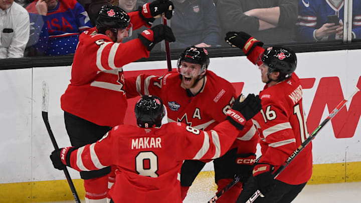 Feb 20, 2025; Boston, MA, USA; [Imagn Images direct customers only]  Team Canada forward Connor McDavid (97) celebrates scoring in overtime to win with defenseman Devon Toews (5) and defenseman Cale Makar (8) and forward Mitch Marner (16) against Team USA during the 4 Nations Face-Off ice hockey championship game at TD Garden. Mandatory Credit: Brian Fluharty-Imagn Images