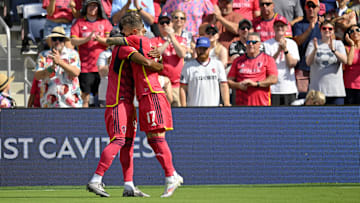 Sep 1, 2024; St. Louis, Missouri, USA; St. Louis CITY SC midfielder Marcel Hartel (17) celebrates with forward Jayden Reid (99) after scoring a goal against the LA Galaxy during the second half at CITYPARK. Mandatory Credit: Scott Rovak-USA TODAY Sports