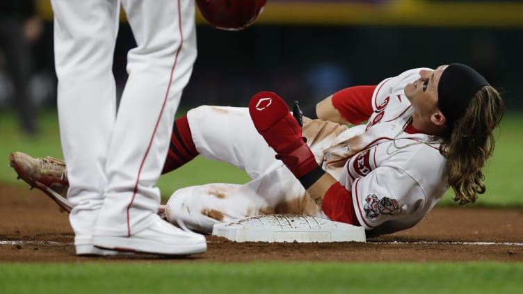 Cincinnati Reds center fielder TJ Friedl (29) is hurt.