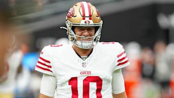 San Francisco 49ers quarterback Mac Jones warms up before a preseason game against the Las Vegas Raiders at Allegiant Stadium.