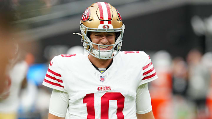 San Francisco 49ers quarterback Mac Jones warms up before a preseason game against the Las Vegas Raiders at Allegiant Stadium.