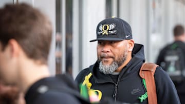 Oregon defensive line coach Tony Tuioti walks into the hotel as the Oregon Ducks arrive in Los Angeles ahead of the Rose Bowl Sunday, Dec. 29, 2024.