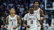 Feb 7, 2025; Storrs, Connecticut, USA; UConn Huskies guard Hassan Diarra (10), center Tarris Reed Jr. (5) and guard Solo Ball (1) on the court after a defeat by the St. John's Red Storm at Harry A. Gampel Pavilion. Mandatory Credit: David Butler II-Imagn Images