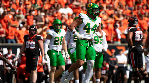 Oregon outside linebacker Teitum Tuioti celebrates a stop as the Oregon State Beavers host the Oregon Ducks Saturday, Sept. 1