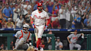 Philadelphia Phillies outfielder Kyle Schwarber watches his grand slam home run during the sixth inning.