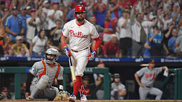 Philadelphia Phillies outfielder Kyle Schwarber watches his grand slam home run during the sixth inning.