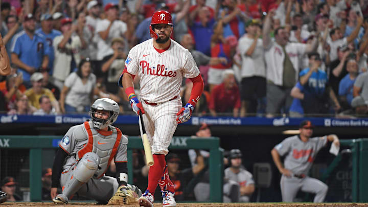 Philadelphia Phillies outfielder Kyle Schwarber watches his grand slam home run during the sixth inning. Philadelphia Phillies outfielder Kyle Schwarber watches his grand slam home run during the sixth inning.