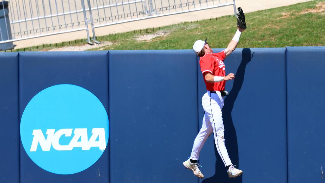 Western Kentucky Hilltoppers outfielder Ryan Wideman (33) attempts to save a three home run hit by Georgia Tech Yellowjackets pitcher/infielder Alex Hernandez (4) during the first inning on May 30, 2025.