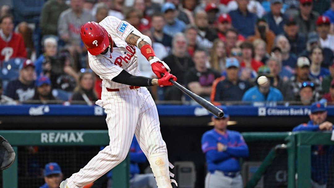 Sep 9, 2025; Philadelphia, Pennsylvania, USA; Philadelphia Phillies outfielder Nick Castellanos (8) hits a two RBI double during the first inning against the New York Mets at Citizens Bank Park. Mandatory Credit: Eric Hartline-Imagn Images