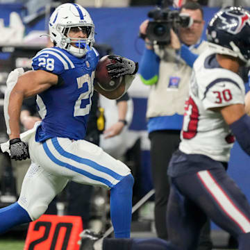 Indianapolis Colts running back Jonathan Taylor (28) rushes along the sideline Saturday, Jan. 6, 2024, during a game against the Houston Texans at Lucas Oil Stadium in Indianapolis.