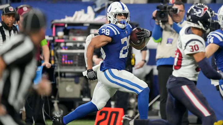 Indianapolis Colts running back Jonathan Taylor (28) rushes along the sideline Saturday, Jan. 6, 2024, during a game against the Houston Texans at Lucas Oil Stadium in Indianapolis.