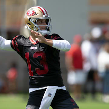 Jul 23, 2025; Santa Clara, CA, USA; San Francisco 49ers quarterback Brock Purdy (13) works on passing drills during the first day of training camp at SAP Performance Facility. Mandatory Credit: D. Ross Cameron-Imagn Images