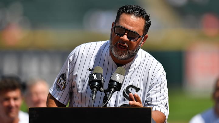 Jul 12, 2025; Chicago, Illinois, USA; Former manager Ozzie Guillen addresses fans at the podium as the 2005 World Series Chicago White Sox are honored prior to a game against the Cleveland Guardians at Rate Field. Mandatory Credit: Patrick Gorski-Imagn Images