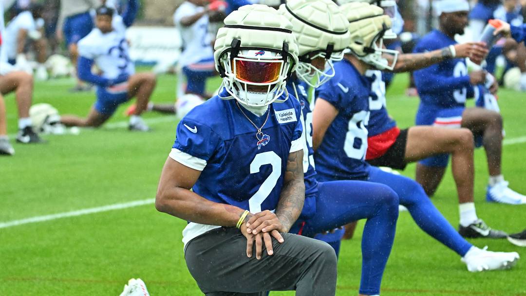 July 29, 2026; Pittsford, NY, USA; Buffalo Bills wide receiver D.J. Moore (2) warms up during training camp practice at St. John Fisher University.