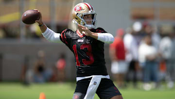 Jul 23, 2025; Santa Clara, CA, USA; San Francisco 49ers quarterback Brock Purdy (13) works on passing drills during the first day of training camp at SAP Performance Facility. Mandatory Credit: D. Ross Cameron-Imagn Images