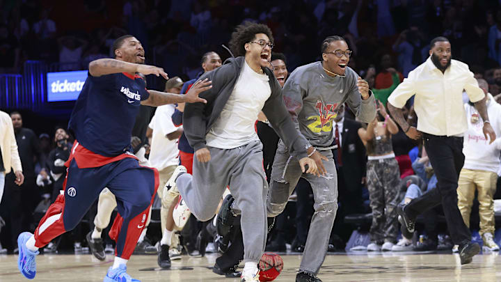 Apr 13, 2025; Miami, Florida, USA; The Washington Wizards bench celebrates the Wizards win against the Miami Heat at Kaseya Center. Mandatory Credit: Rhona Wise-Imagn Images