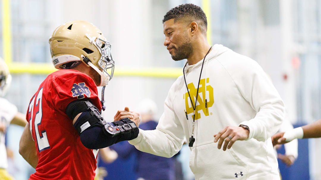 Head coach Marcus Freeman, right, greets running back Aneyas Williams during a Notre Dame football practice at Irish Athletic Center on Friday, March 20, 2026, in South Bend. Head coach Marcus Freeman, right, greets running back Aneyas Williams during a Notre Dame football practice at Irish Athletic Center on Friday, March 20, 2026, in South Bend.