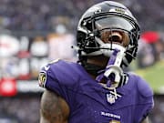 Jan 28, 2024; Baltimore, Maryland, USA; Baltimore Ravens wide receiver Zay Flowers (4) celebrates after scoring a touchdown against the Kansas City Chiefs during the first half in the AFC Championship football game at M&T Bank Stadium. Mandatory Credit: Geoff Burke-Imagn Images