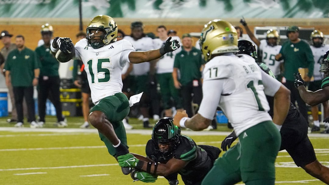 Running back Alvon Isaac (15) helped contribute to USF's offensive eruption at North Texas