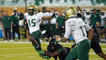 Running back Alvon Isaac (15) helped contribute to USF's offensive eruption at North Texas