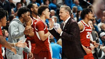 Arkansas head coach John Calipari gives high fives to his team as the Razorbacks took the half time lead over Kentucky Saturday Feb. 1, 2025 at Rupp Arena in Lexington, Kentucky.