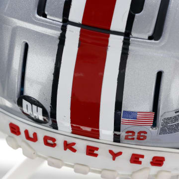 Apr 16, 2022; Columbus, Ohio, USA; Ohio State Buckeyes helmet with sticker to honor Dwayne Haskins during the first half of the Scarlett and Gray Spring Game at Ohio Stadium. Mandatory Credit: Joseph Maiorana-USA TODAY Sports