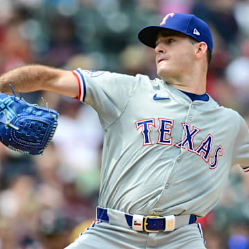 Aug 25, 2024; Cleveland, Ohio, USA; Texas Rangers starting pitcher Cody Bradford (61) throws a pitch during the first inning against the Cleveland Guardians at Progressive Field.