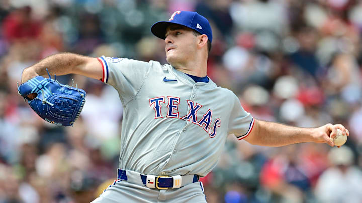 Aug 25, 2024; Cleveland, Ohio, USA; Texas Rangers starting pitcher Cody Bradford (61) throws a pitch during the first inning against the Cleveland Guardians at Progressive Field.