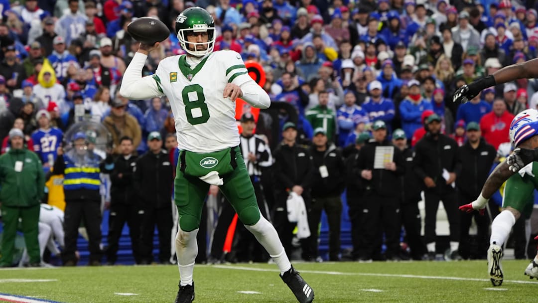 Dec 29, 2024; Orchard Park, New York, USA; New York Jets quarterback Aaron Rodgers (8) throws the ball against the Buffalo Bills during the first half at Highmark Stadium. Mandatory Credit: Gregory Fisher-Imagn Images