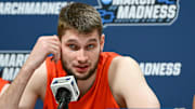 Mar 20, 2025; Milwaukee, WI, USA; Illinois Fighting Illini center Tomislav Ivisic (13) speaks at press conference during NCAA Tournament First Round Practice at Fiserv Forum. Mandatory Credit: Benny Sieu-Imagn Images